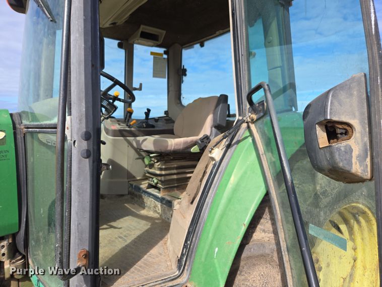 image for item EN6009 2004 John Deere 6415 MFWD tractor