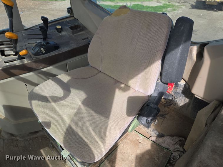 image for item EN6009 2004 John Deere 6415 MFWD tractor