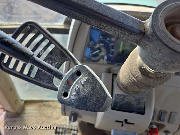 image for item EN6009 2004 John Deere 6415 MFWD tractor