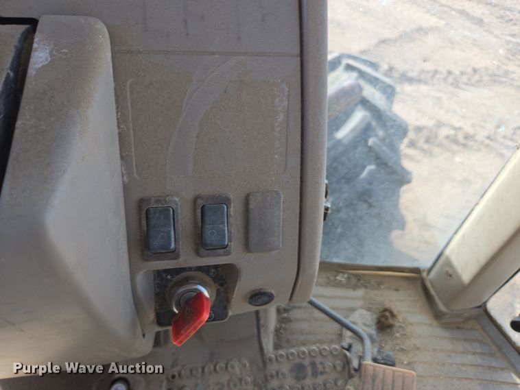 image for item EN6009 2004 John Deere 6415 MFWD tractor