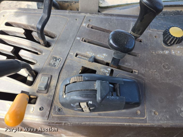 image for item EN6009 2004 John Deere 6415 MFWD tractor