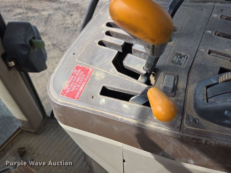 image for item EN6009 2004 John Deere 6415 MFWD tractor