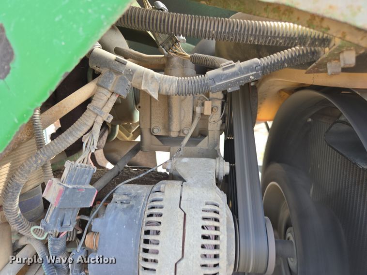 image for item EN6009 2004 John Deere 6415 MFWD tractor