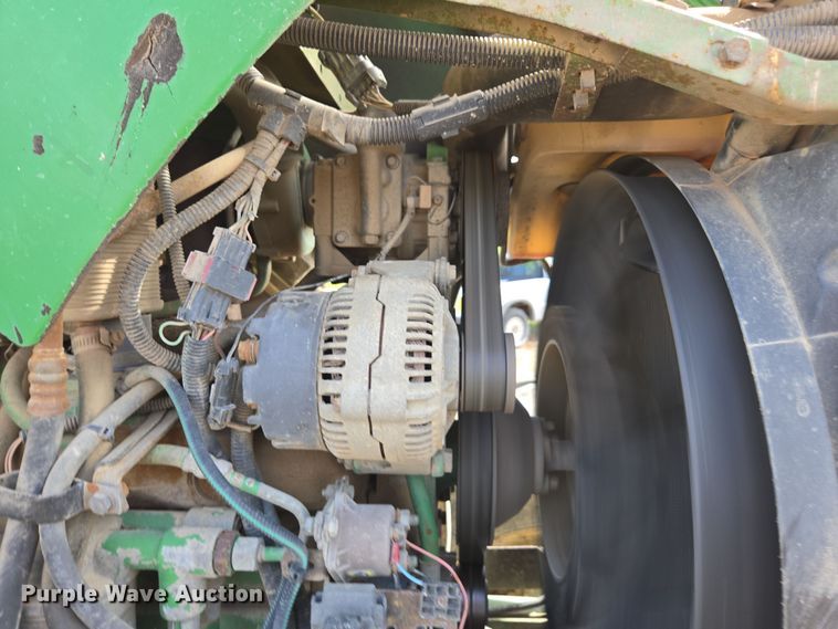 image for item EN6009 2004 John Deere 6415 MFWD tractor