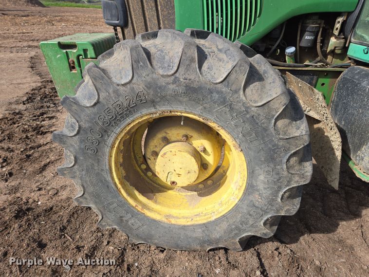 image for item EN6009 2004 John Deere 6415 MFWD tractor