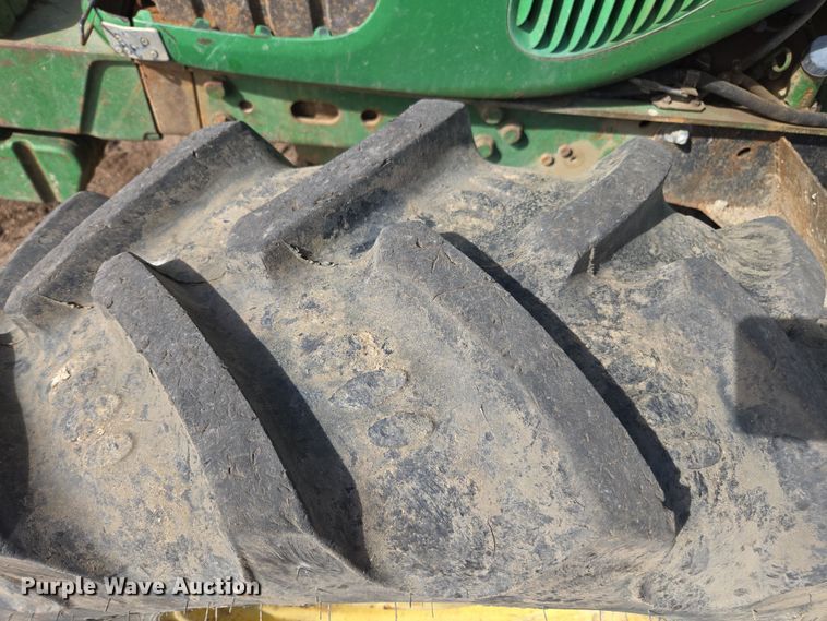 image for item EN6009 2004 John Deere 6415 MFWD tractor