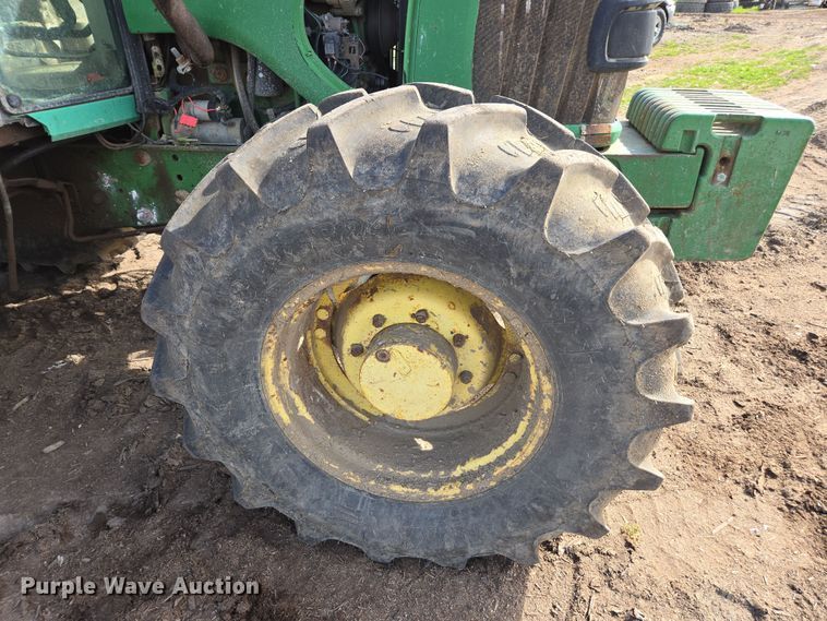 image for item EN6009 2004 John Deere 6415 MFWD tractor