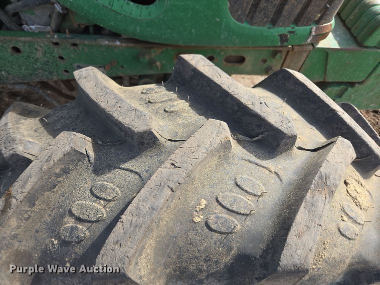 image for item EN6009 2004 John Deere 6415 MFWD tractor