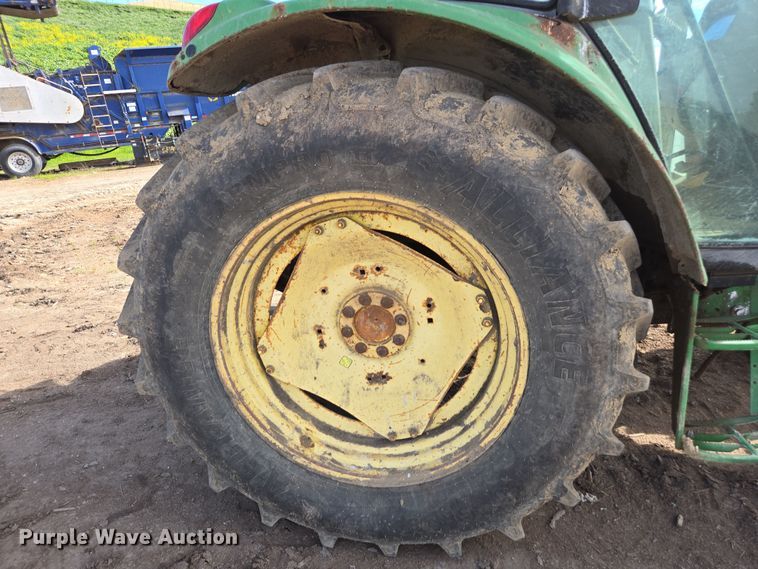 image for item EN6009 2004 John Deere 6415 MFWD tractor