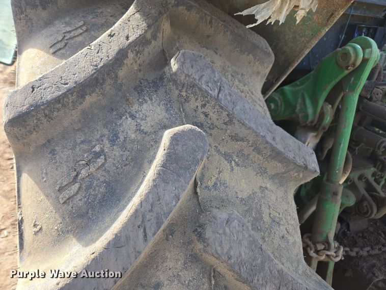 image for item EN6009 2004 John Deere 6415 MFWD tractor