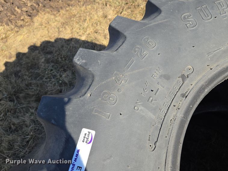 image for item EQ6701 (2) Firestone Super All Traction FWD 18.4-26 tires