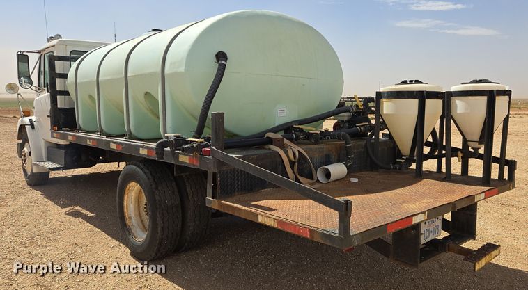 image for item DW8554 1995 Freightliner FL60 flatbed truck