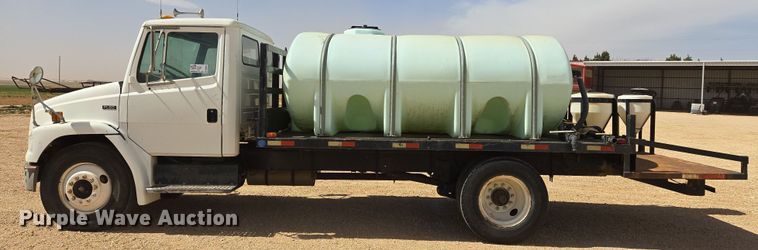 image for item DW8554 1995 Freightliner FL60 flatbed truck