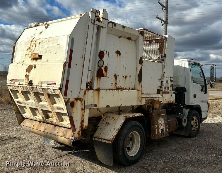 image for item DV0622 1999 Isuzu NPR HD refuse truck