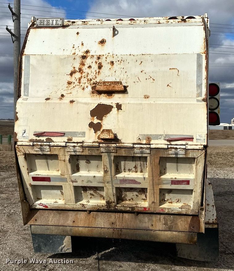 image for item DV0622 1999 Isuzu NPR HD refuse truck