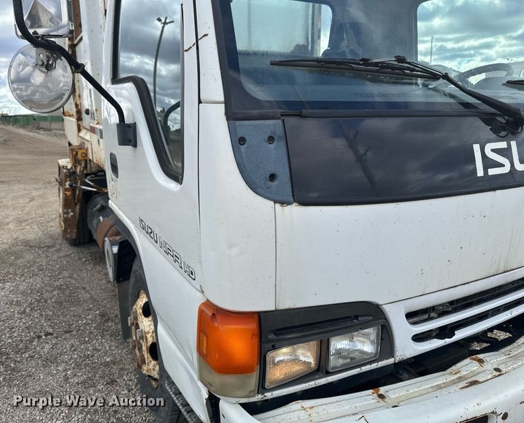 image for item DV0622 1999 Isuzu NPR HD refuse truck