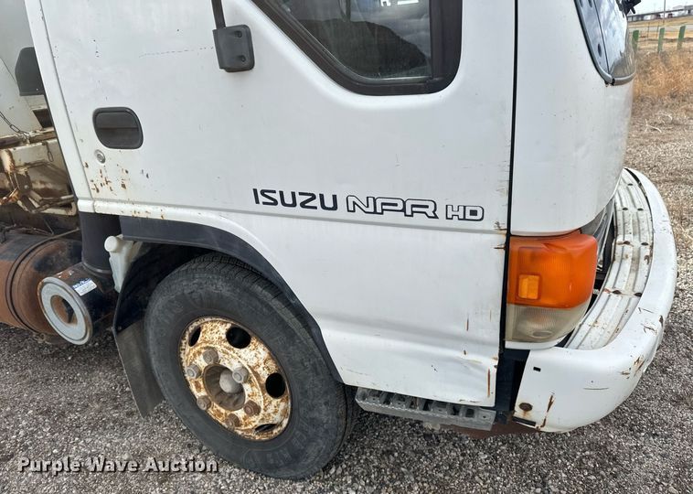 image for item DV0622 1999 Isuzu NPR HD refuse truck