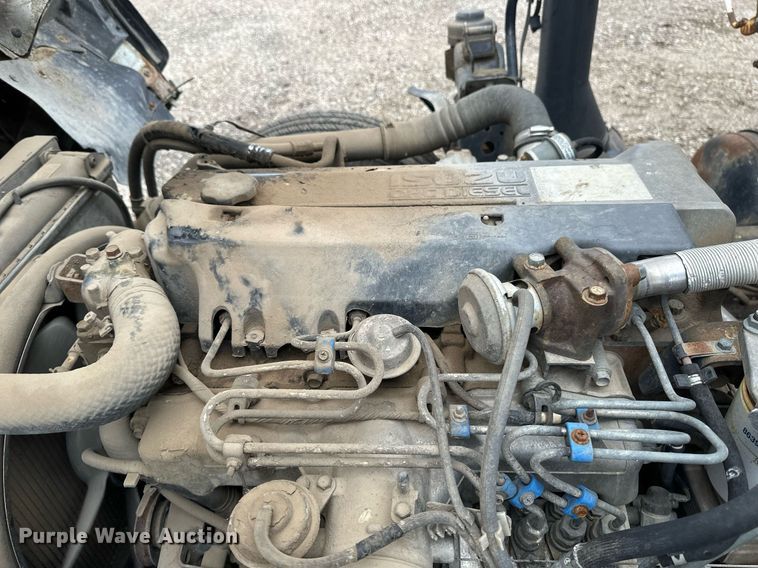 image for item DV0622 1999 Isuzu NPR HD refuse truck