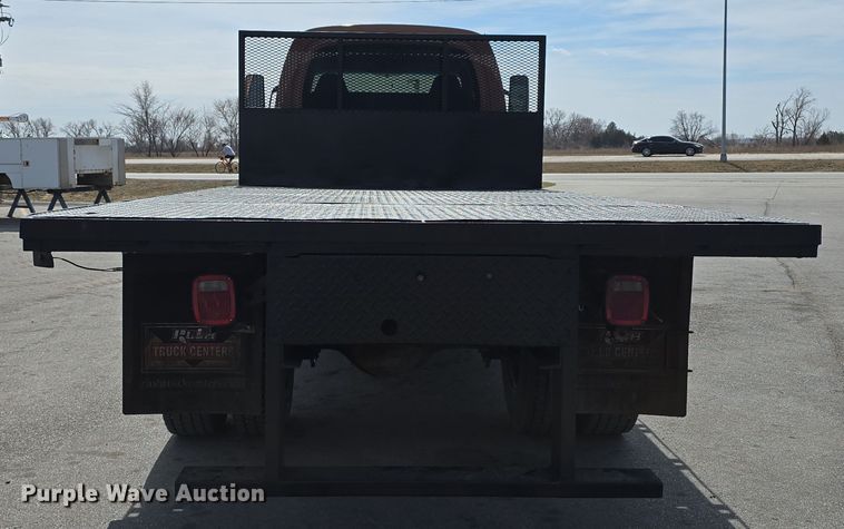 image for item DW3233 2004 GMC C6500 Crew Cab flatbed truck