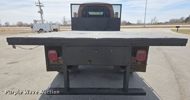 image for item DW3233 2004 GMC C6500 Crew Cab flatbed truck