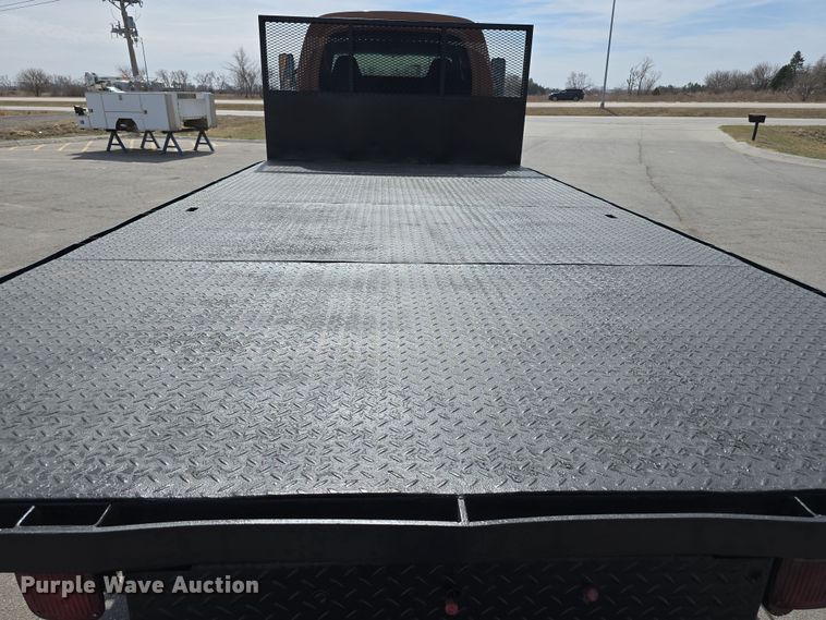 image for item DW3233 2004 GMC C6500 Crew Cab flatbed truck