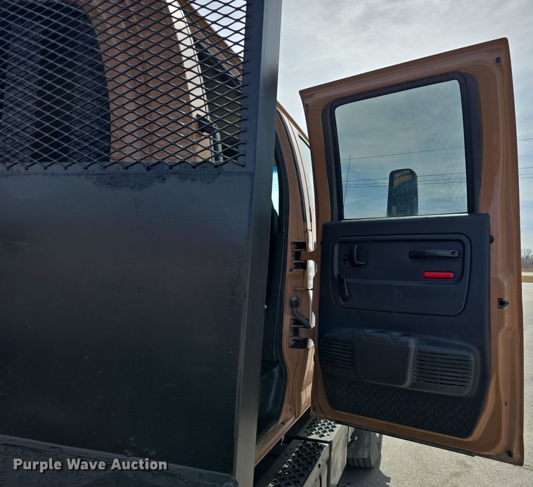 image for item DW3233 2004 GMC C6500 Crew Cab flatbed truck