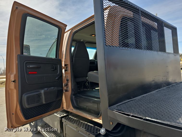 image for item DW3233 2004 GMC C6500 Crew Cab flatbed truck