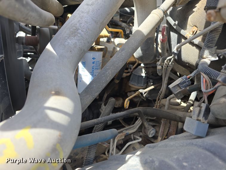 image for item DW3233 2004 GMC C6500 Crew Cab flatbed truck