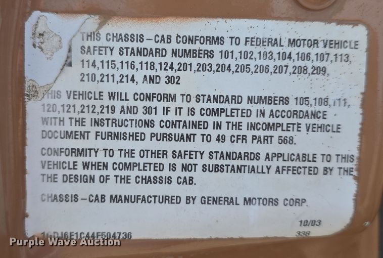 image for item DW3233 2004 GMC C6500 Crew Cab flatbed truck