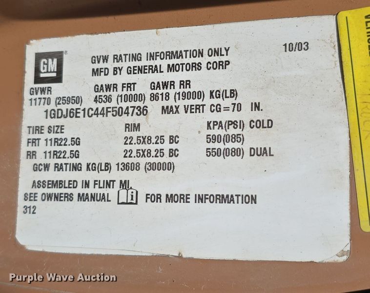 image for item DW3233 2004 GMC C6500 Crew Cab flatbed truck