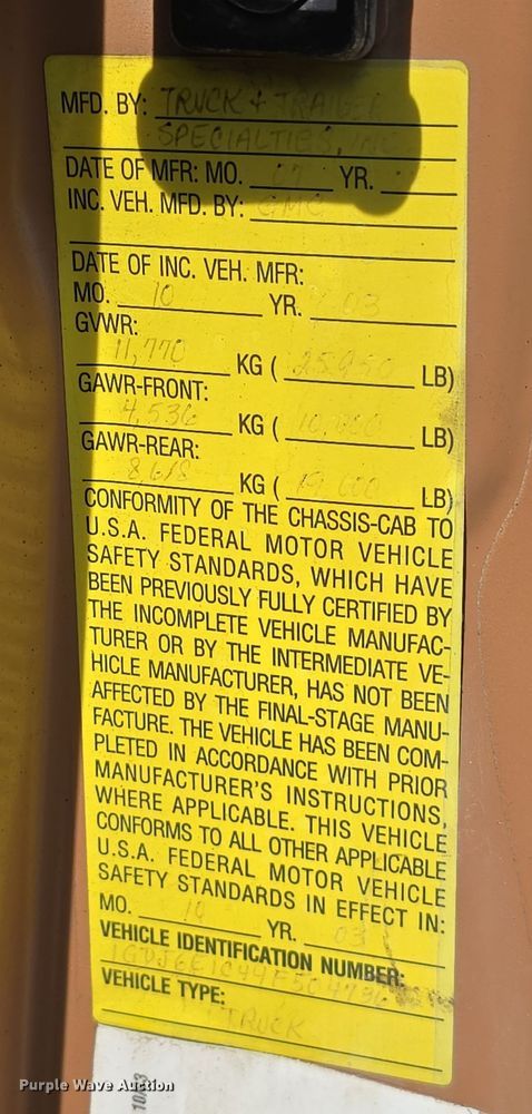 image for item DW3233 2004 GMC C6500 Crew Cab flatbed truck