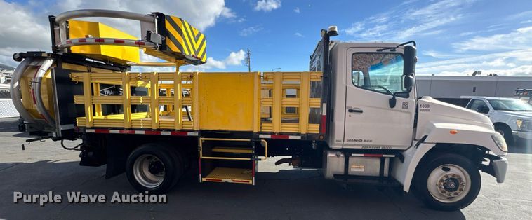 image for item EN6001 2010 Hino 268 flatbed truck with crash attenuator