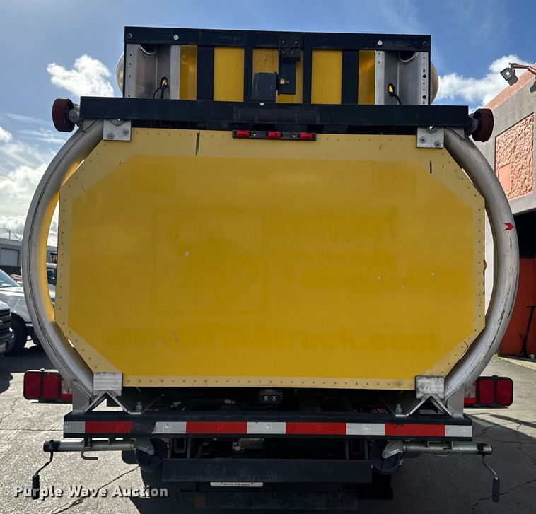 image for item EN6001 2010 Hino 268 flatbed truck with crash attenuator