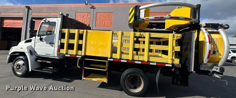 image for item EN6001 2010 Hino 268 flatbed truck with crash attenuator