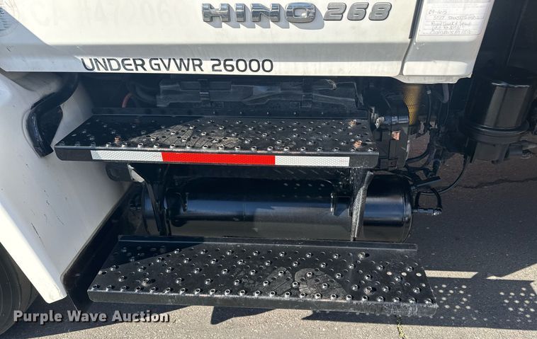 image for item EN6001 2010 Hino 268 flatbed truck with crash attenuator