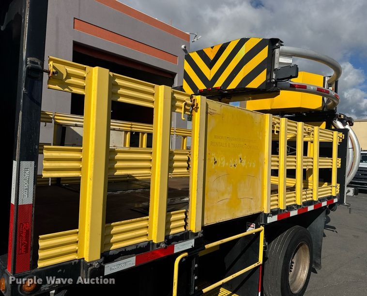 image for item EN6001 2010 Hino 268 flatbed truck with crash attenuator