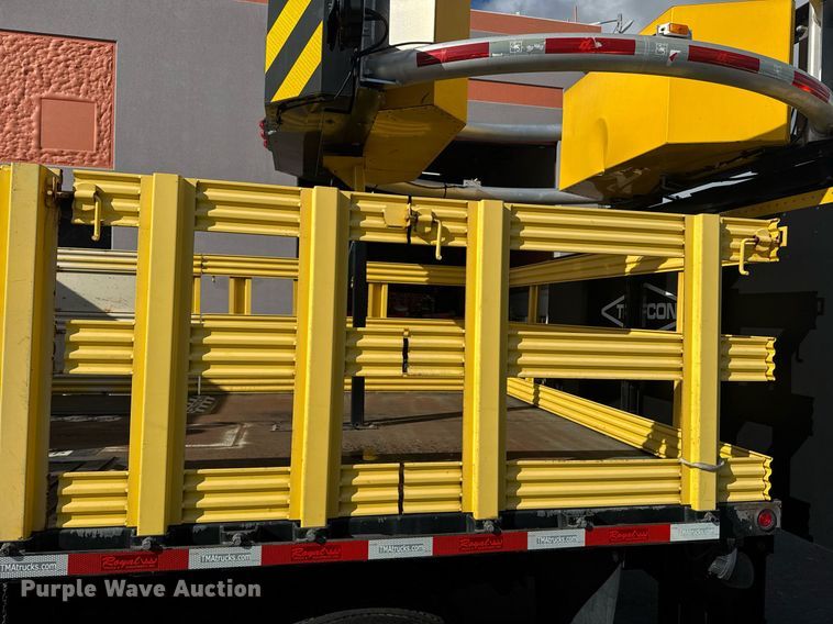 image for item EN6001 2010 Hino 268 flatbed truck with crash attenuator