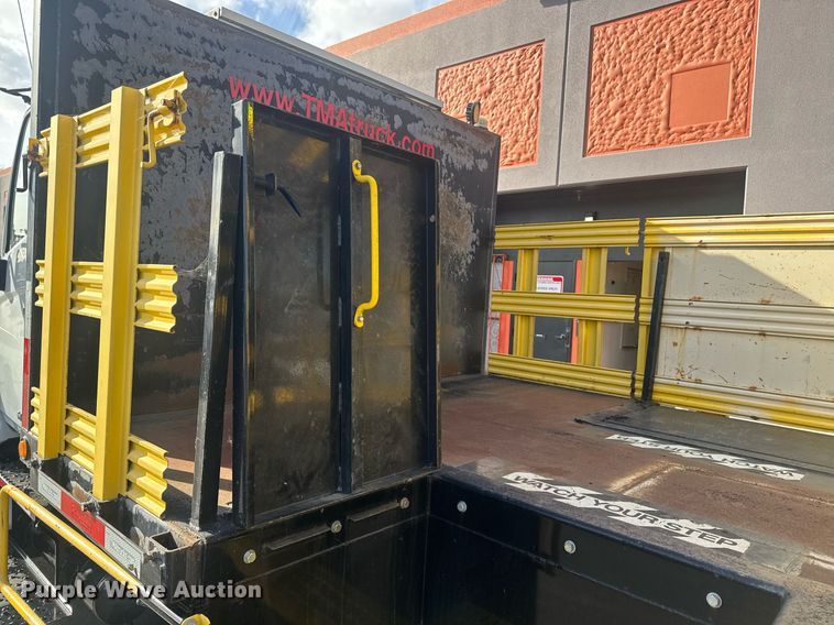 image for item EN6001 2010 Hino 268 flatbed truck with crash attenuator