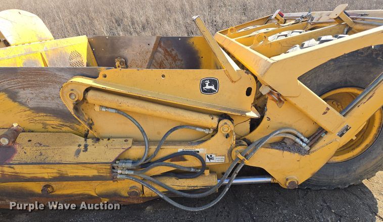 image for item EQ6766 2005 John Deere  1812C  scraper