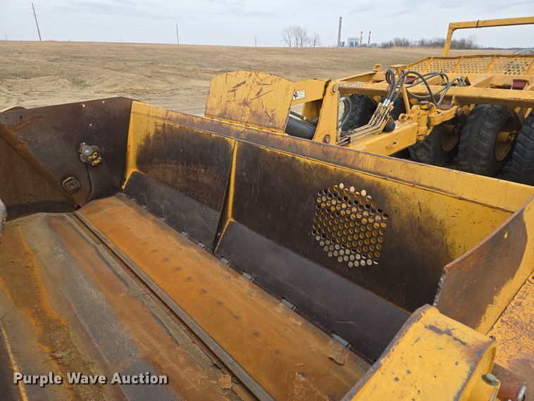 image for item EQ6773 2006 John Deere  1814C  scraper