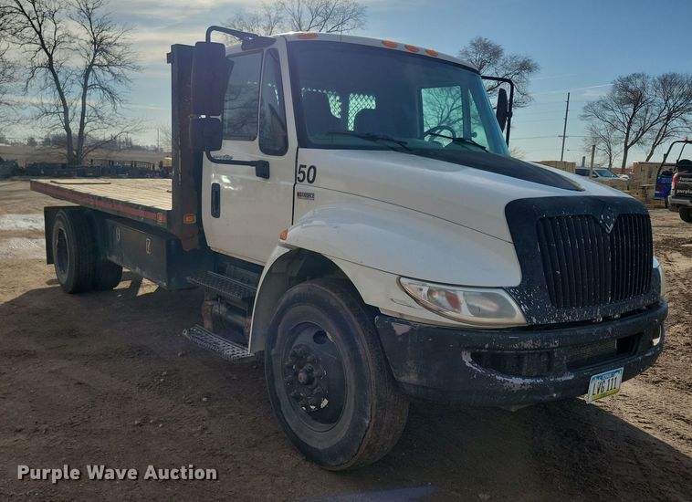 image for item NB9889 2014 International  Dura Star 4300 dump flatbed truck