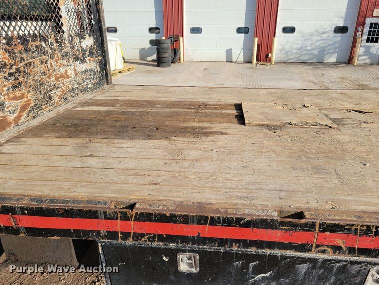 image for item NB9889 2014 International  Dura Star 4300 dump flatbed truck