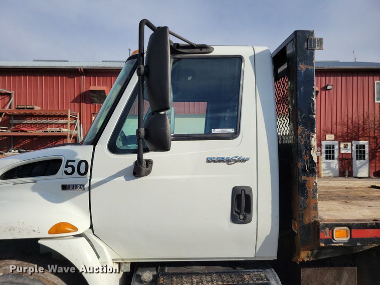 image for item NB9889 2014 International  Dura Star 4300 dump flatbed truck