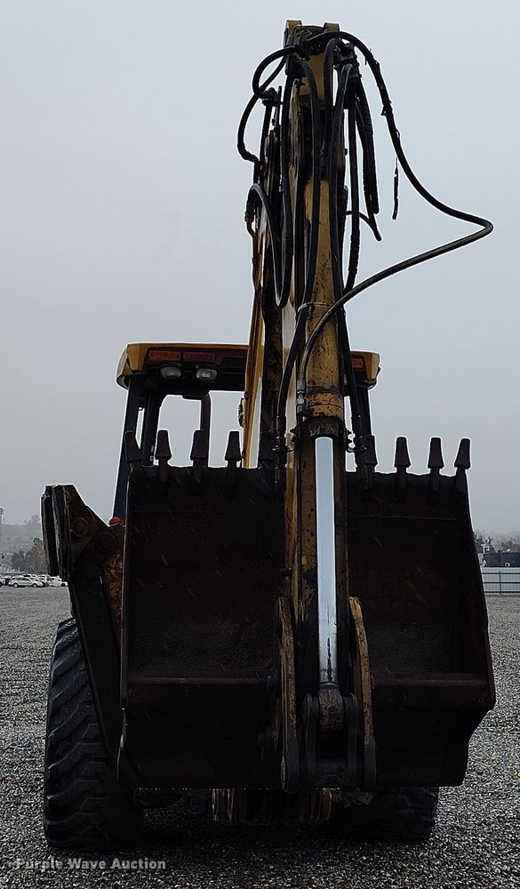 image for item YA0340 2004 John Deere  710G backhoe
