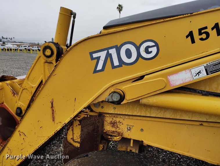 image for item YA0340 2004 John Deere  710G backhoe
