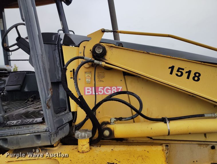 image for item YA0340 2004 John Deere  710G backhoe