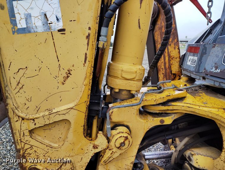 image for item YA0340 2004 John Deere  710G backhoe