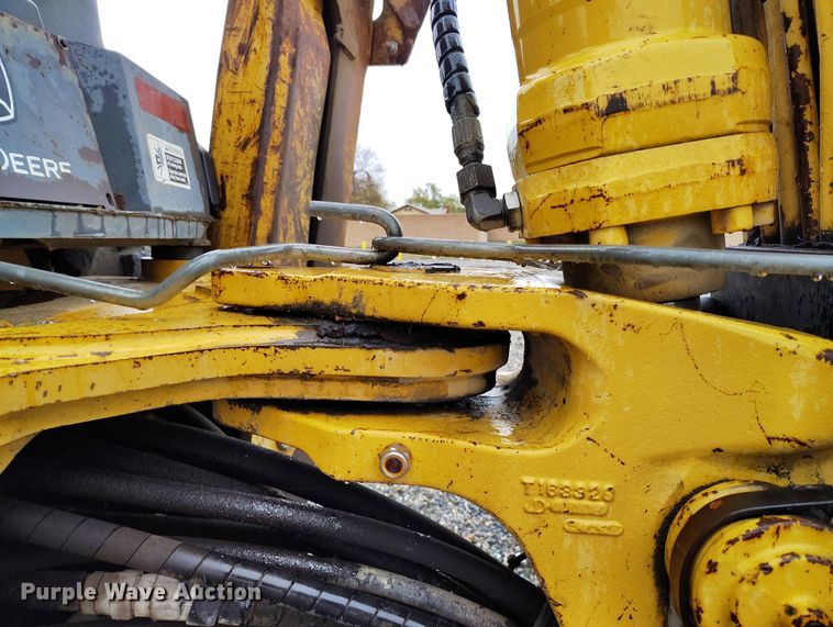 image for item YA0340 2004 John Deere  710G backhoe