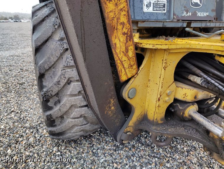 image for item YA0340 2004 John Deere  710G backhoe