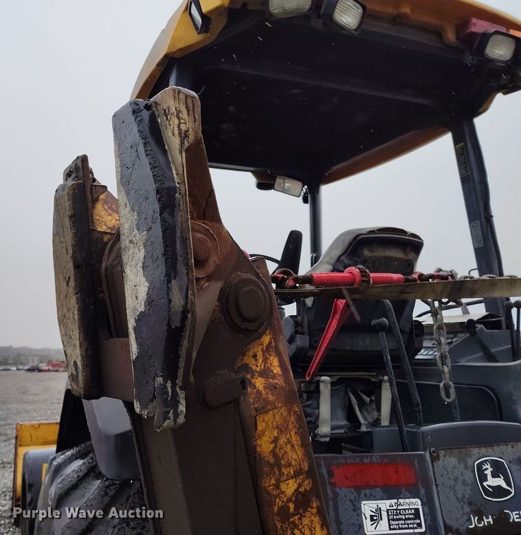 image for item YA0340 2004 John Deere  710G backhoe